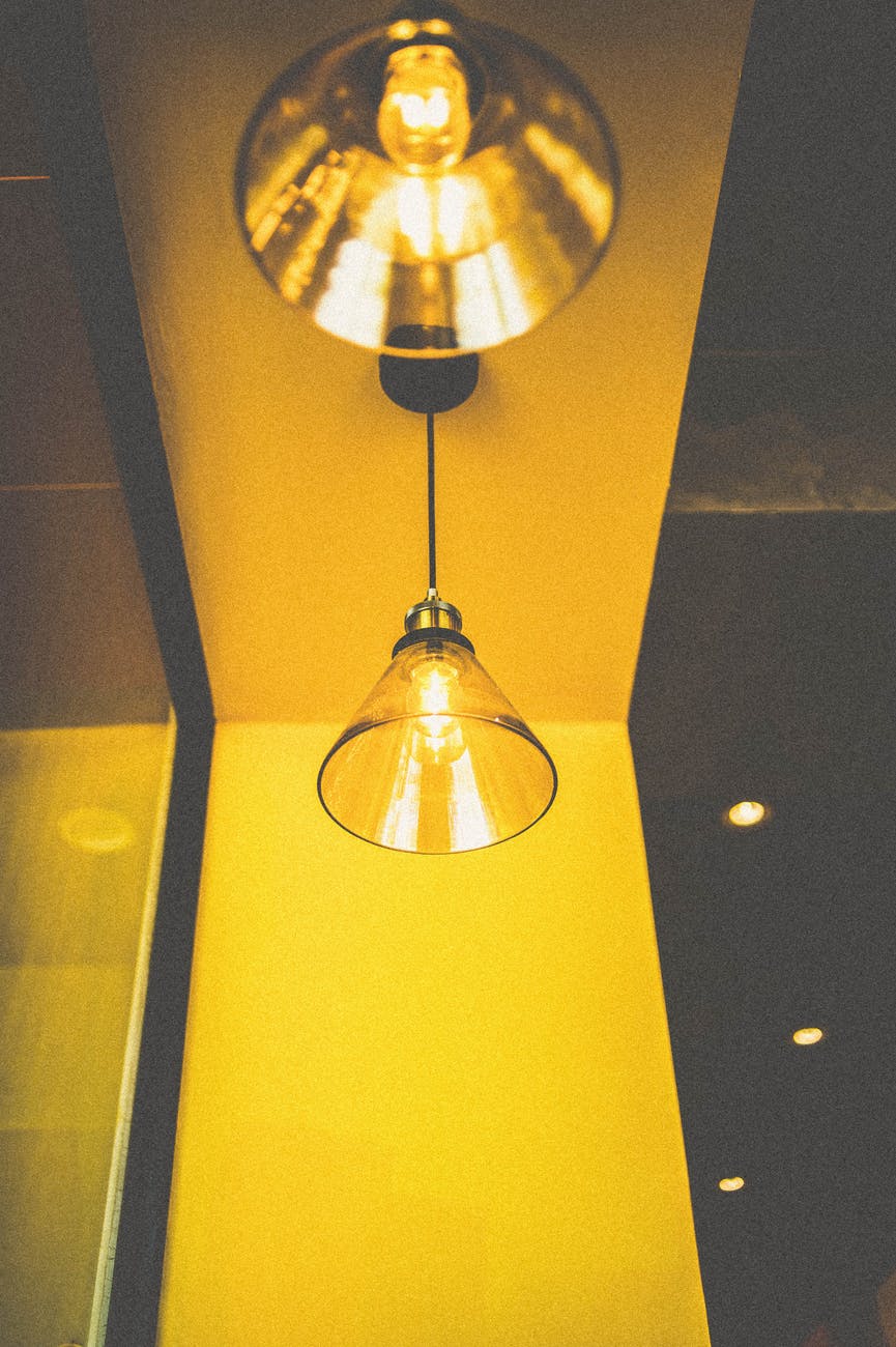 closeup photo of turned on pendant light