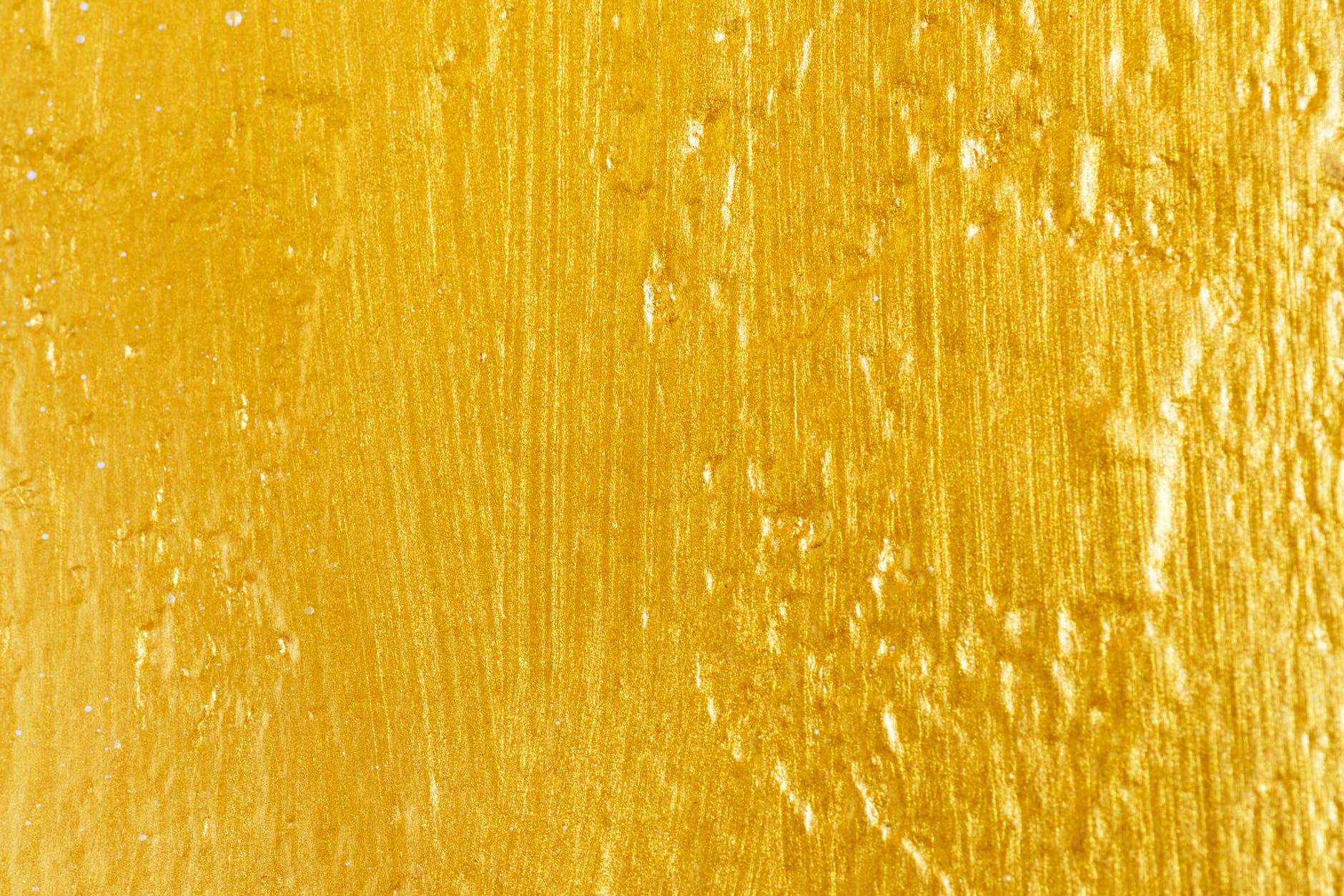close up photo of yellow surface